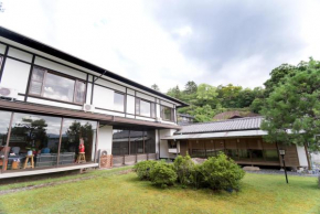 Гостиница Miyajima Guest House Mikuniya  Хиросима-Хатсукайчи